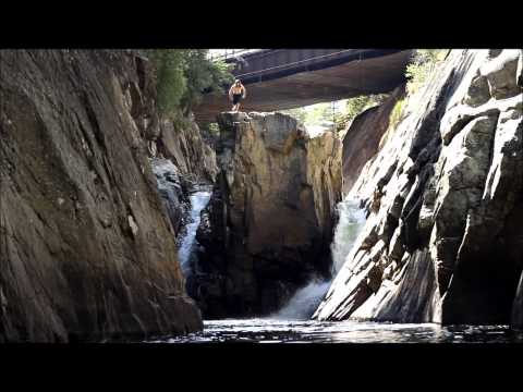 Alex BOOSTIN off a gnarly ass cliff