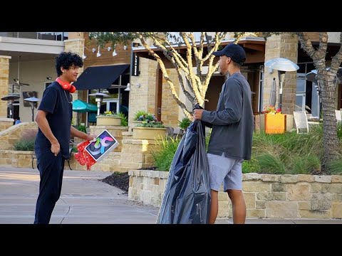 Homeless Guy Giving Strangers ‘EXPENSIVE GIFTS’ For Helping!