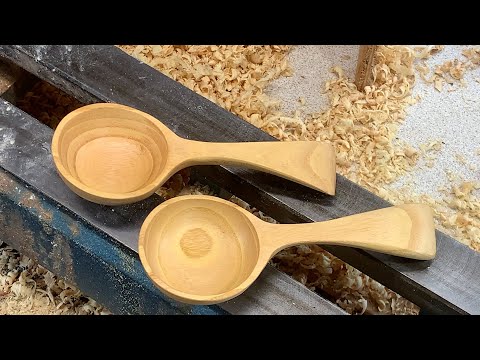 Richard Raffan turns a pair of ladles.