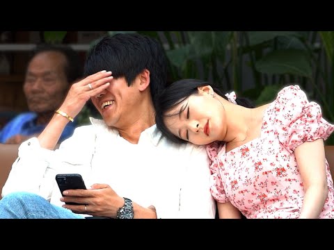 Girl Fall Asleep on the Shoulders of Strangers