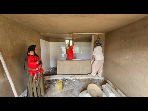 A single mother plasters the interior of her home with the help of two master builders