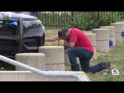 Cleveland police officer shot and killed overnight; suspect in custody