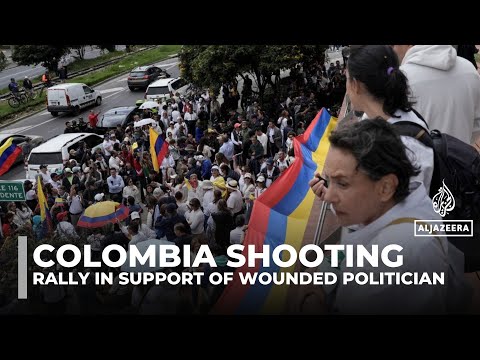 Supporters of wounded Colombian presidential candidate Uribe rally in Bogota after shooting