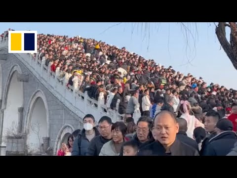 Bridge in China swamped with tourists during Lunar New Year holiday