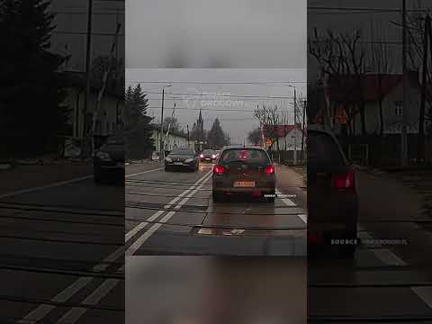 #Train narrowly passes between #cars at #railway #crossing
