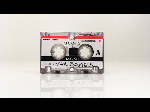 Microcassette data backup using acoustic coupling