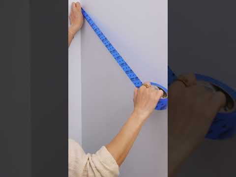 A Bright Accent Wall Defines This Kids’ Room “Entryway”