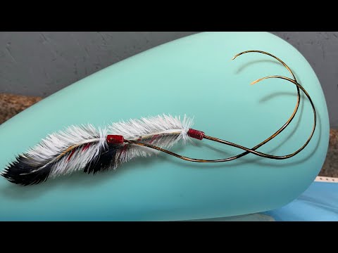 Airbrushing feathers on a tank