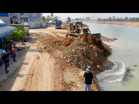 Look Out!​​ Resize Road on Canal Using Bulldozer Clearing Soil, Dump Truck Transport Soil into Canal
