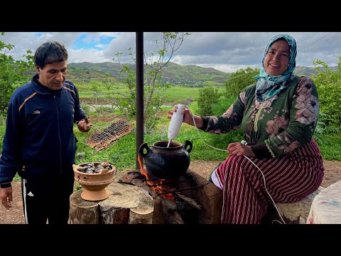 اعداد حساء العدس الاحمر مع السمك المشوي في جو ممطر