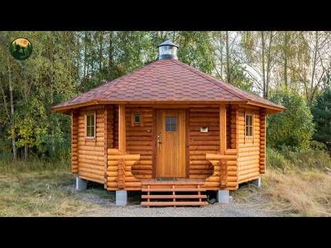 Man Builds A Unique Circular Wooden House Topped With A Beautiful Cone Roof