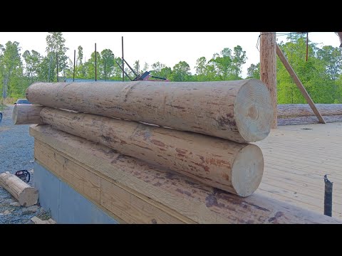 Cabin build, stacking the log walls, cabin construction