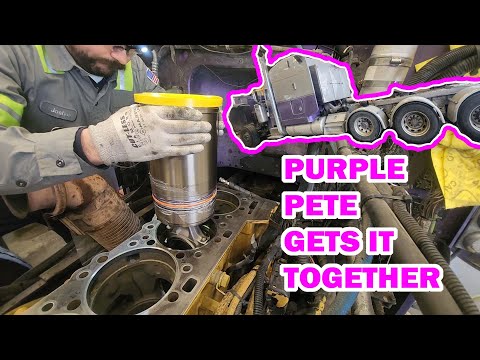 "Purple Pete" gets it together. C-15 with Aftermarket Cylinder head.
