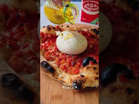 Pizza with Burrata and roasted tomatoes, it tastes just like heaven 🤤