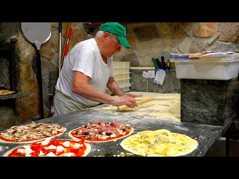 For 60 years! Roman Pizza Master baking more than 300 Wood-fired oven pizzas every day!
