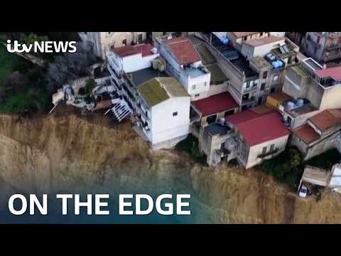 Dramatic drone footage shows houses on cliff edge after landslide | ITV News