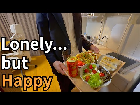 A Japanese Salaryman Eats Dinner Alone and Thinks About Happiness