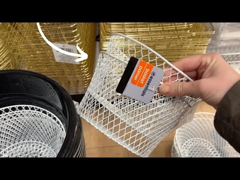 Slide 2 Dollar Store baskets on a paper towel holder (BRILLIANT!)