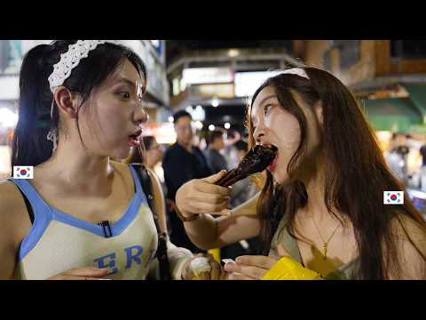 韓國美女們在臺灣夜市第一次吃鴨頭的反應..鼻孔好吃..