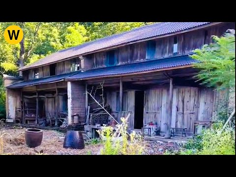 Two brothers have renovated and cut the grass in a abandoned wooden house for many years