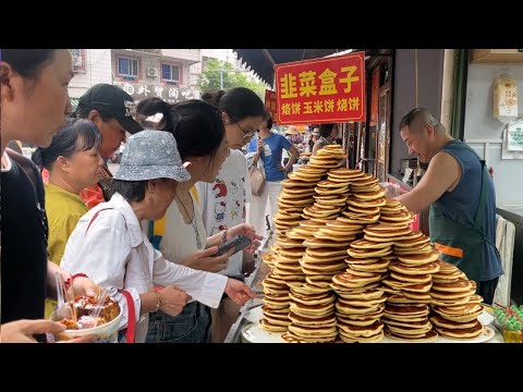 广西南宁超人气的美食聚集地，赶传统市集，品特色街头美食，老牌的香豆腐排队排到脚软，量足价低的糖水店每天卖断货，当地特色的手工油茶不吃白来，金黄酥脆的韭菜盒子一口一个，软糯弹牙的糯米糍粑老人小孩都爱吃。