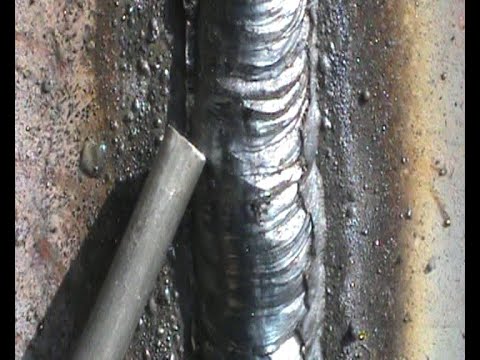 Vertical weld with electrode. Welding of profile pipe without burn-throughs and burrs.