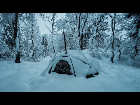 hot tent solo camping in heavy snow