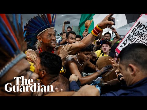 Protesters force their way into Cop30 climate summit