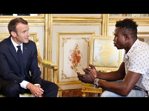 "Spiderman" who saved child dangling from Paris balcony offered French citizenship by Macron