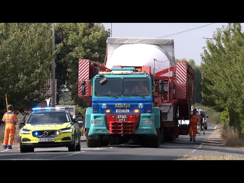 706 tonne vehicle escorted by police through tiny old English village