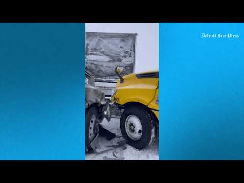 Driver walks through crash after 100-car pileup in Michigan