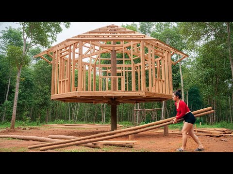 A Young Woman Built a Mysterious Bamboo House on a Single Pillar