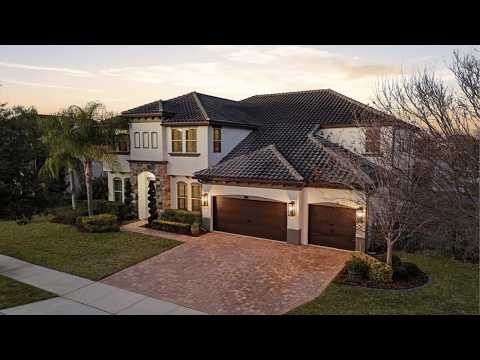 INSIDE a Johns Lake Waterfront Estate with Dock, Pool & Indoor-Outdoor Living | SERHANT. Tour