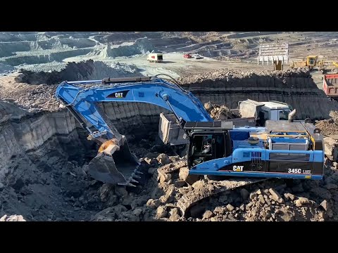 Big Excavators, Wheel Loaders, Bulldozers, Heavy Transports, And Front Shovel Excavators | Mining