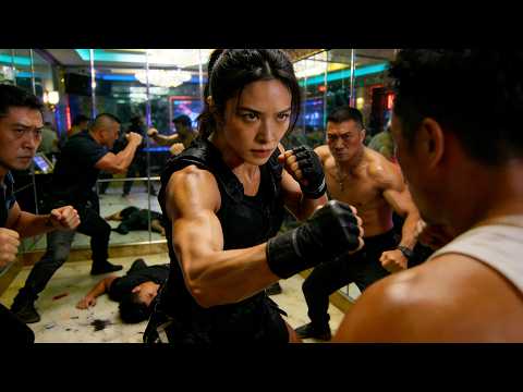 Thug insults a woman, not knowing she’s special police; she KOs him and his gang.