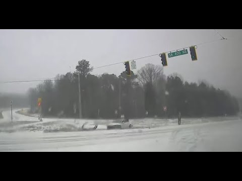 Cars slide off Forysth County roads from heavy snow