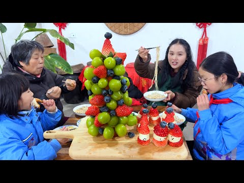 A fruit platter,a bowl of noodles for each person,and Yike said he wanted more.