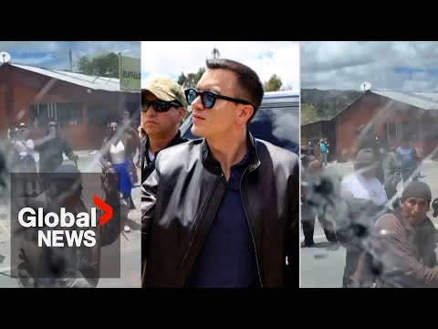 Ecuador president's motorcade attacked by 100s of people