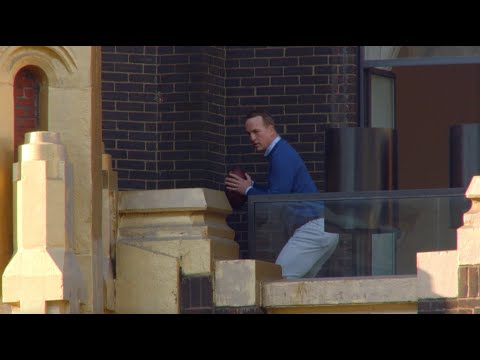 Peyton Manning Throws a Football Off Skyscraper