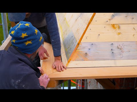 The cedar for the roof arrives.