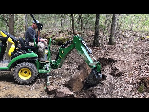 My Little John Deere 1025r ROCKS - Clearing trails in the woods - Episode 1