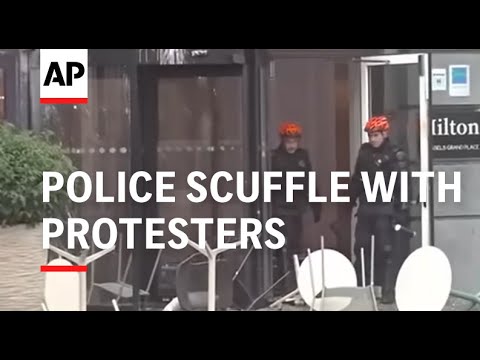 Police in Brussels scuffle with protesters angered by austerity plans