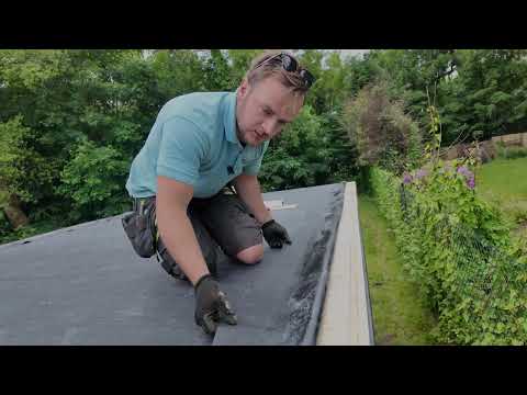 HOW DO YOU FIT THE RUBBER ROOF ON A CABIN?