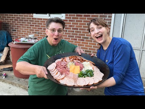 Making a whole pot of budaejjigae for my Ukrainian mother-in-law, who is trying it for the first ...