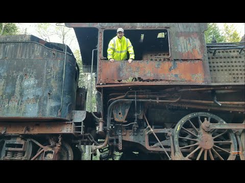 Abandoned Railway Deep In The Woods Of Maine With Dozens Of Freight Cars