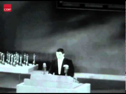 Ernest Borgnine accepting an Oscar for best actor at the 1956 Academy Awards