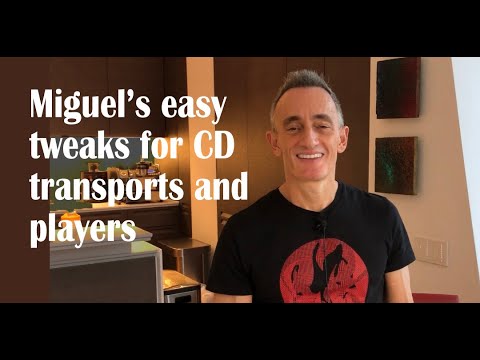 Miguel pops the lid on his CD transport to tweak the sound