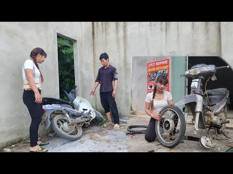 The girl repaired the badly damaged motorbike, restoring the entire engine of the motorbike.