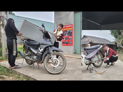 The best girl in the Gulf of Tonkin repairs a refrigerator frozen like it's in the polar ice cap.