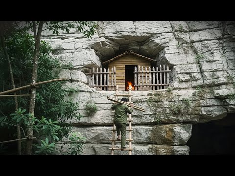 The man builds shelter on steep cliffs to avoid wild animals / survives alone in dangerous places